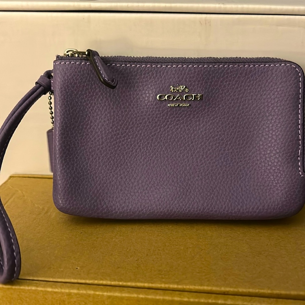 Coach double zip plum colored wristlet